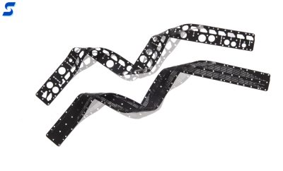 Long, black chemically resistant Viton gaskets with waterjet cut holes along the length
