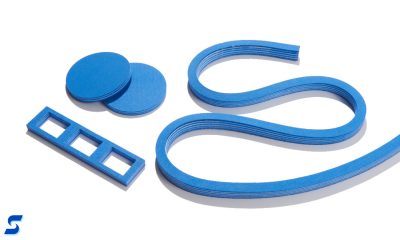Blue R10490 flurosilicone sponge with layers of white RTV between each of 4 layers of sponge 